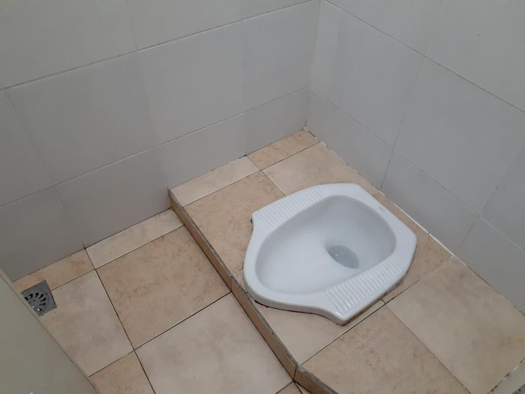ホテル Kost Carmelia Syariah Baranangsiang ボゴール 部屋 写真