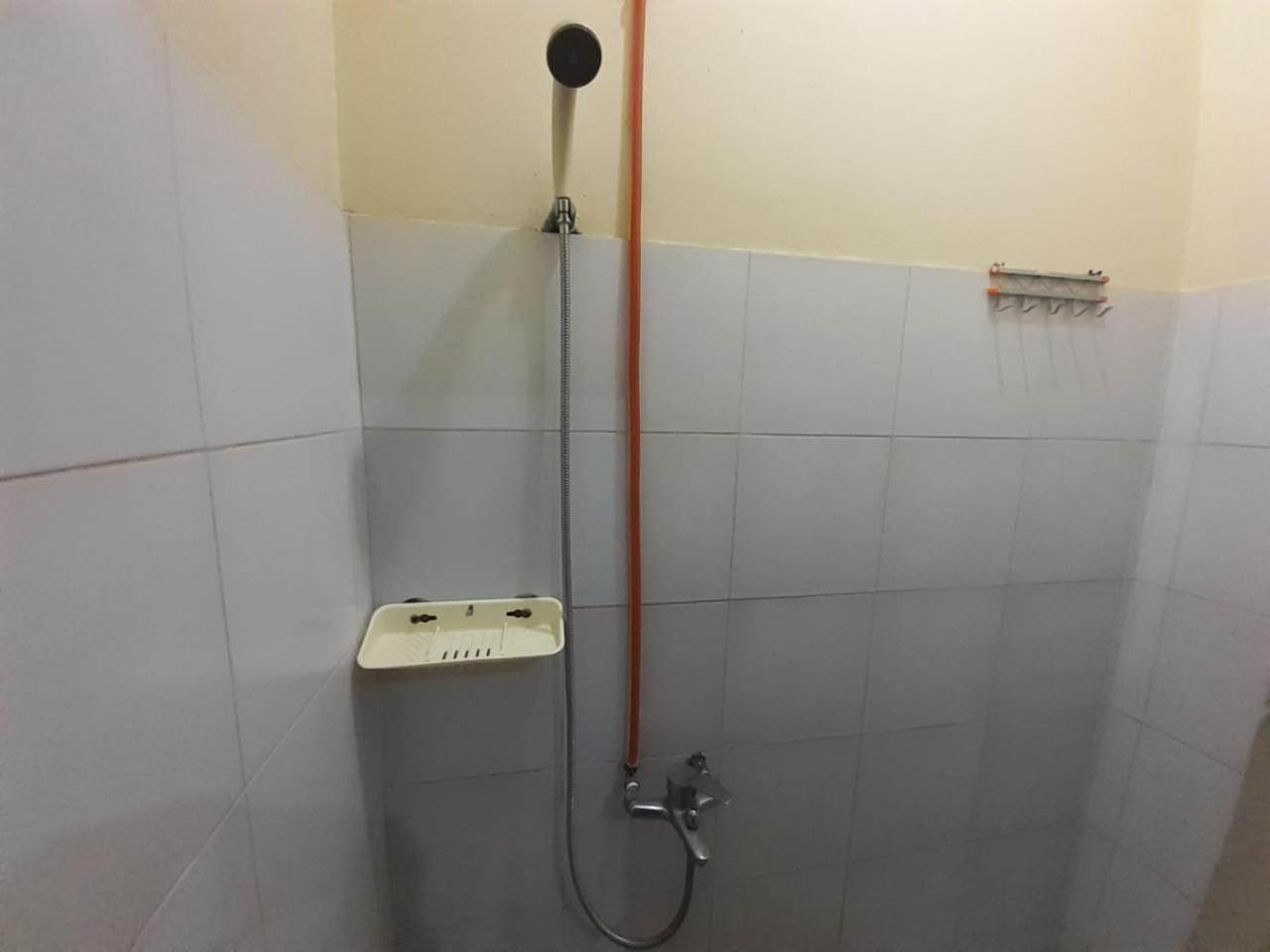 ホテル Kost Carmelia Syariah Baranangsiang ボゴール 部屋 写真