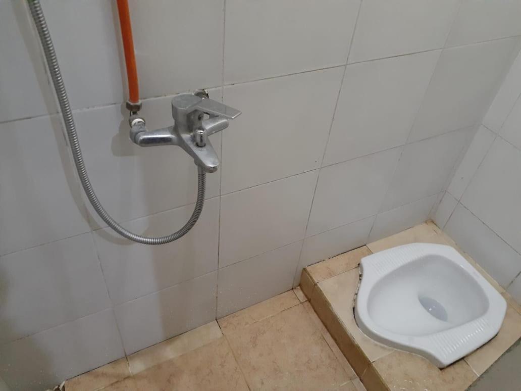 ホテル Kost Carmelia Syariah Baranangsiang ボゴール 部屋 写真